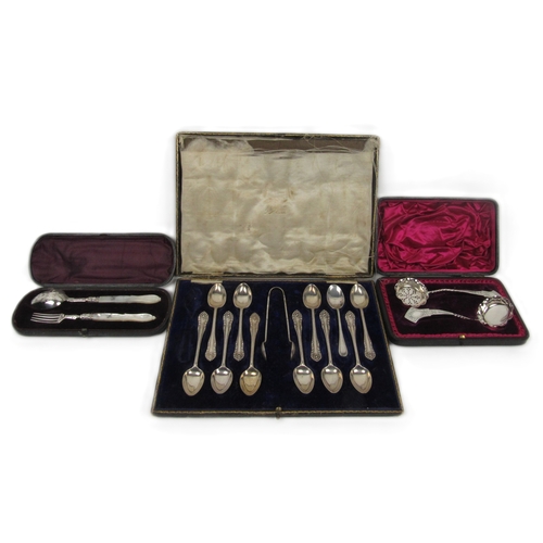 12 - A cased set of 11 silver Teaspoons and Tongs, by Edward Barnard & Sons Ltd., London; a cased att... 