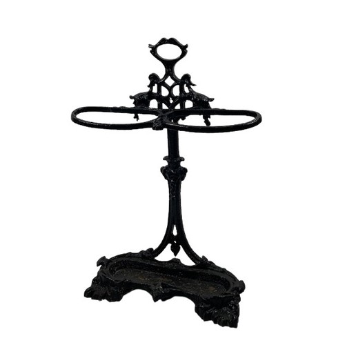 564 - A Victorian cast iron Coalbrookdale Stick and Umbrella Stand, with carrying handle, above two holder... 