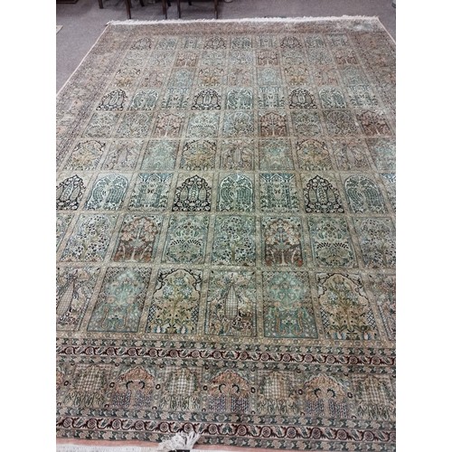 1193 - A magnificent pair of 20th Century silk Middle Eastern Carpets, the cream and rust ground with multi... 