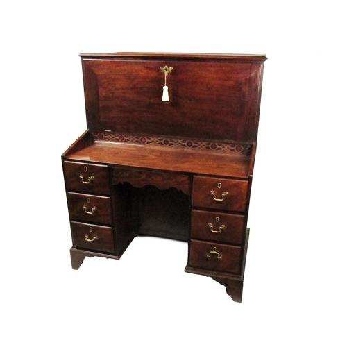 1034 - A rare and important Irish Georgian mahogany Estate Desk, in the manner of Chippendale, the upright ... 