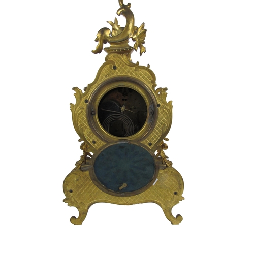 1053 - A fine quality Louis XVI French style ormolu Clock, the overall decorated in the rococo taste, with ... 