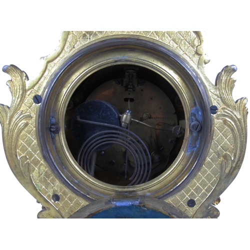 1053 - A fine quality Louis XVI French style ormolu Clock, the overall decorated in the rococo taste, with ... 