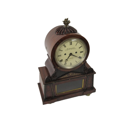 1078 - A very fine quality Regency period English Bracket Clock, the circular top with brass flame finial a... 