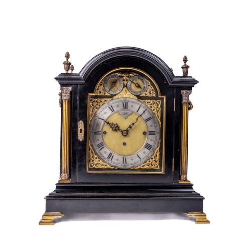 1080 - A fine quality Victorian ebonised chiming Bracket Clock, the arched top with ornate brass acorn topp... 