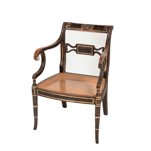 1104 - A Regency ebonised Open Armchair, the shaped back with central carved lions head, with scroll arms, ... 