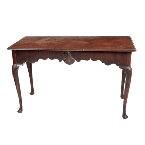 1106 - A fine quality 19th Century Irish mahogany Side Table, the plain moulded top over a shaped frieze wi...