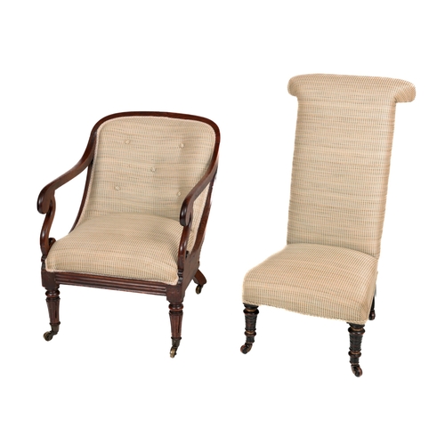 1135 - A Victorian mahogany framed Open Armchair, of low proportions with reeded front legs and scroll... 