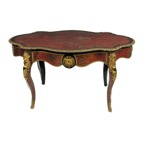 1172 - A 19th Century French ormolu mounted red boulle Table, the shaped oval top with cast egg n' dart mou... 