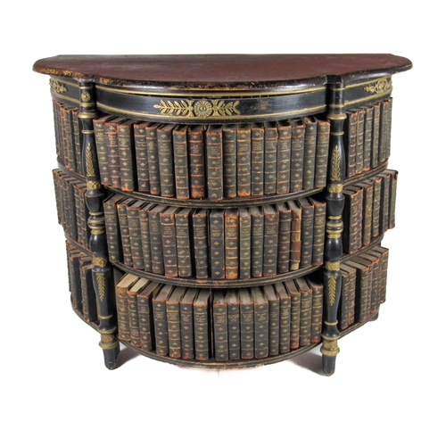 553 - A Regency style shaped ebonised and ormolu mounted Open Bookcase, with three sections and three shel... 