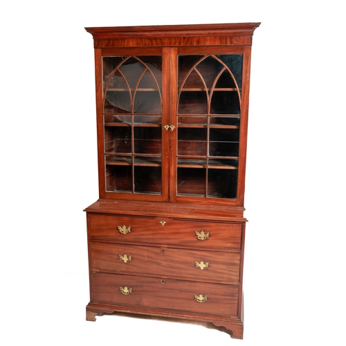 559 - An attractive 19th Century mahogany two door Bookcase, of small proportions, the moulded cornice ove... 