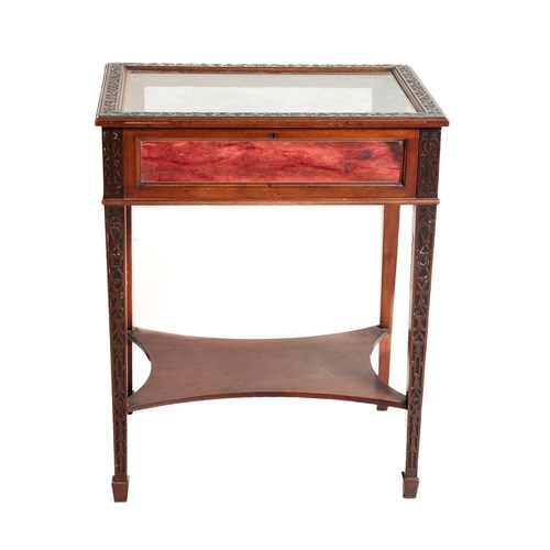 561 - A late 19th Century mahogany Chippendale style two door Cabinet, the moulded top over astragal glaze... 