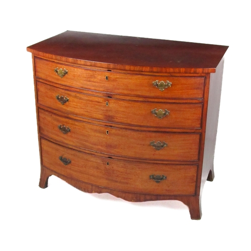 562 - A Georgian mahogany bow fronted Chest of Drawers, the plain top over four long drawers with ornate b... 