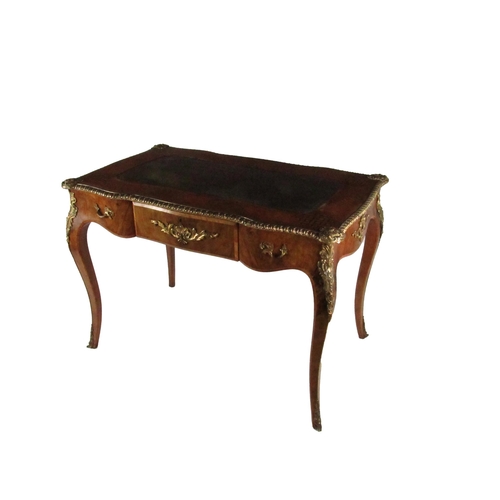 574 - A very fine quality English Victorian Bureau Plat, the leather inset top with tooled gilt border,  i... 