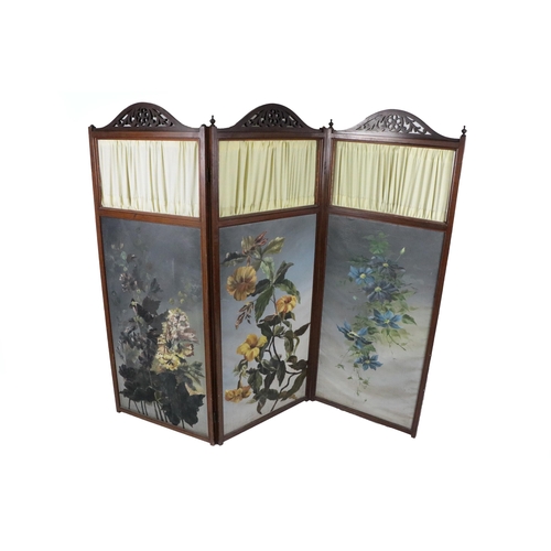 620 - An attractive three part folding Draught Screen, with pierced and arched fretwork capital over cloth... 