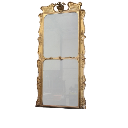 630 - A large late 18th Century / early 19th Century giltwood upright compartmental Pier Mirror, with swan... 