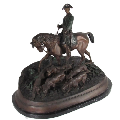 722 - After P.J. Mene (French 1810-1879)Bronze depicting a Huntsman on horseback leading a pack of dogs on... 