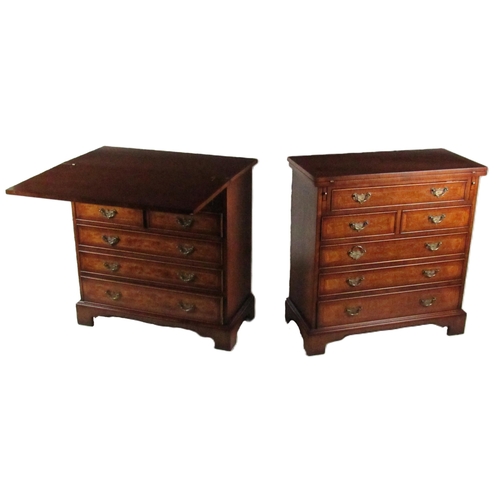 728 - A pair of attractive Georgian style mahogany Bachelors Chests, each with inlaid and crossbanded fold... 