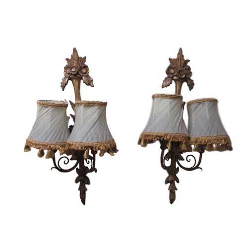 737 - A pair of French style giltwood two branch Wall Sconce Lights, with shades and floral motif. (2)Prov... 