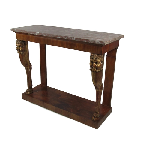 824 - An unusual late 18th Century / early 19th Century mahogany and parcel gilt Side or Console Table, wi... 