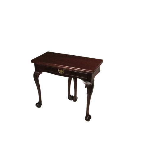 849 - An Irish Georgian period mahogany fold-over Tea Table,  the plain top over a frieze with single long... 