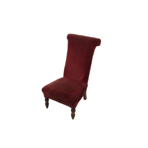 850 - A Victorian Prie-dieu, with front turned legs covered in burgundy fabric. (1)