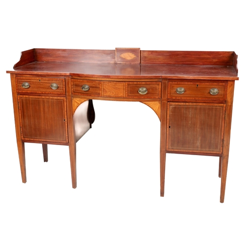 856 - A 19th Century mahogany bow fronted Sideboard, with gallery back and inlaid shell decorated centre, ... 