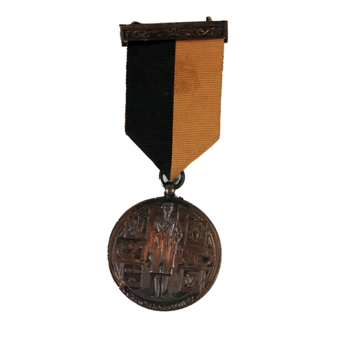 648 - A War of Independence Medal (1917-22), with Celtic design suspension bar, black and amber ribbon, th... 