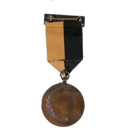 648 - A War of Independence Medal (1917-22), with Celtic design suspension bar, black and amber ribbon, th... 