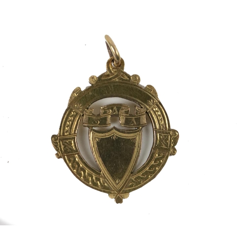 797 - Kilkenny Football Championship 1922Medal: G.A.A., Co. Kilkenny 1922, a 9ct gold circular and shield ... 