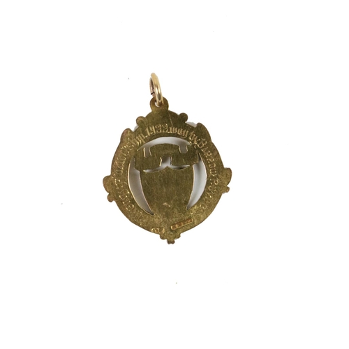 797 - Kilkenny Football Championship 1922Medal: G.A.A., Co. Kilkenny 1922, a 9ct gold circular and shield ... 