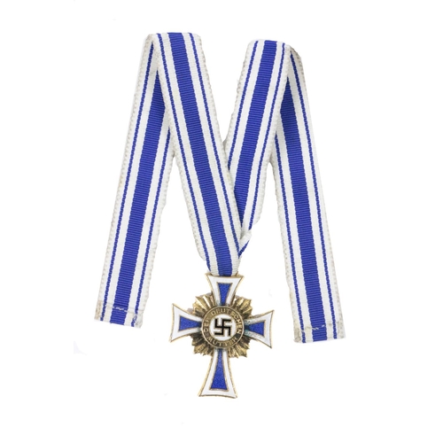 817 - Medal: A German 'Der Deutsche Mutter (German Mothers Cross) Medal, cobalt blue enamel cross with whi... 