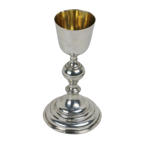 100 - An important 18th Century Irish 'Penal' silver Chalice, c. 1754, of bulbous design with gilded inter... 