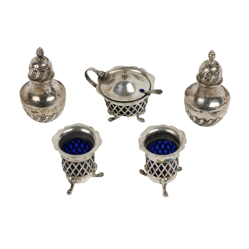 18 - An attractive pair of 19th Century English silver Salt & Pepper, each with spiral finials, etche... 