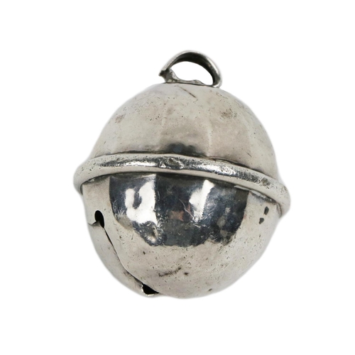 20 - A silver Child's Bell, Birmingham c. 1927, of globular shape with panelled decoration and a centre r... 