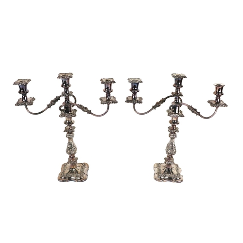 3 - A pair of Victorian silver plated embossed floral and leaf decorated three branch Candelabra, approx... 