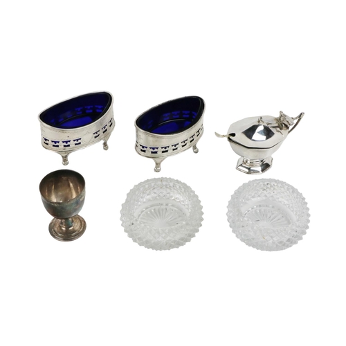 36 - An attractive pair of English silver Georgian style oval Salts, with blue glass liners, and etched a... 