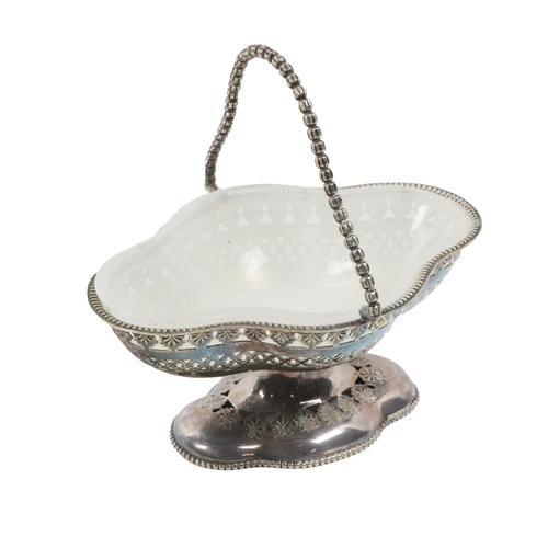 58 - A late Victorian silver plated quatrefoil shaped Jam Dish, supported on a pedestal base with a beade... 