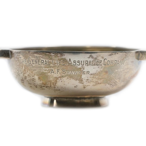 75 - A silver Quaich, Birmingham c. 1937, of typical style with plain circular shallow bowl supported on ... 