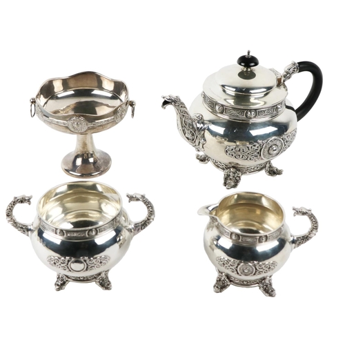 96 - An attractive four piece Celtic Revival design Tea Service, comprising teapot, two handled sugar bow... 