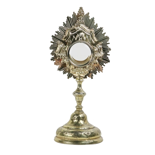 101 - An important 18th Century etched and decorated silver gilt Monstrance, the base with floral design a... 