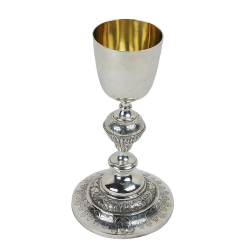 102 - An Irish silver Chalice, the decorated and etched base with vine leaves and grapes, hallmarked (S.L.... 