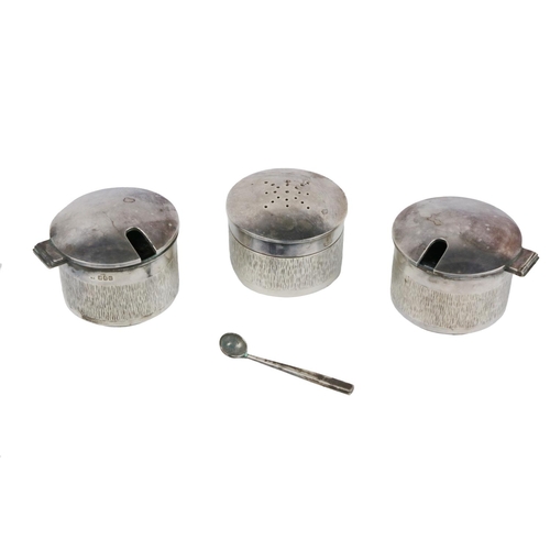 112 - A cased three part Irish silver Condiment Set, of modern design by Brian Clarke?, comprising salt, p... 