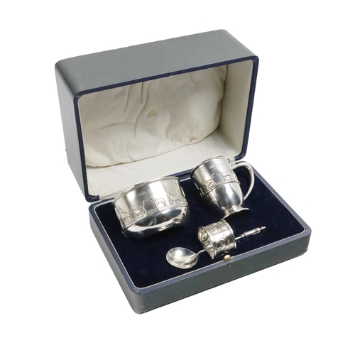 119 - A silver four piece 