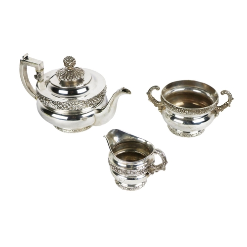 127 - A fine quality and heavy 19th Century three piece English silver Tea Service, the teapot with hinged... 