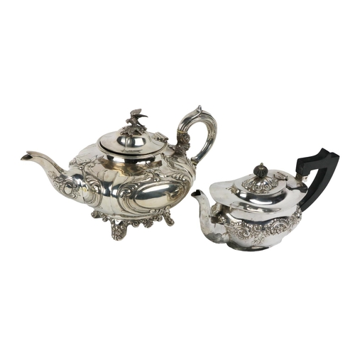 129 - An attractive Victorian Irish silver Teapot, by John Smyth, Dublin, c. 1855, the hinged top with bir... 