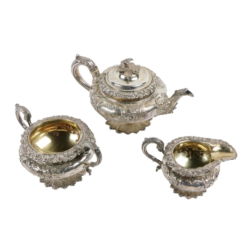 133 - A silver three piece Tea Set, by William Cunningham, Edinburgh 1831, with circular swelling bodies o... 