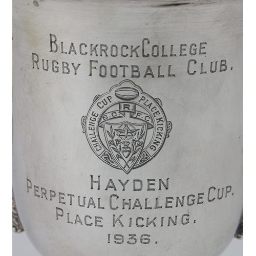 134 - Silver: Sporting [Blackrock College] a two handled silver Trophy Cup, with ornate scroll silver hand... 