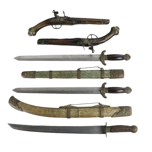 157 - Militaria: A mid-19th Century Chinese 'Twin' Sword, each with carved half handles with ornate metal ... 