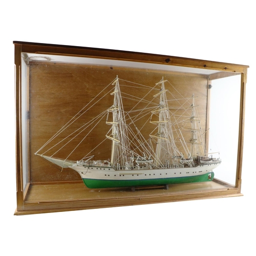 159 - A large cased Model, of a mast ship painted green and white, approx. 69cms high x 112cms wide x 36cm... 