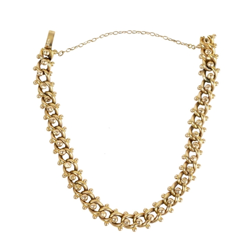 189 - A Ladies 9ct gold ornate link Chain, with box catch, approx. 14.5gms (some wear). (1)... 